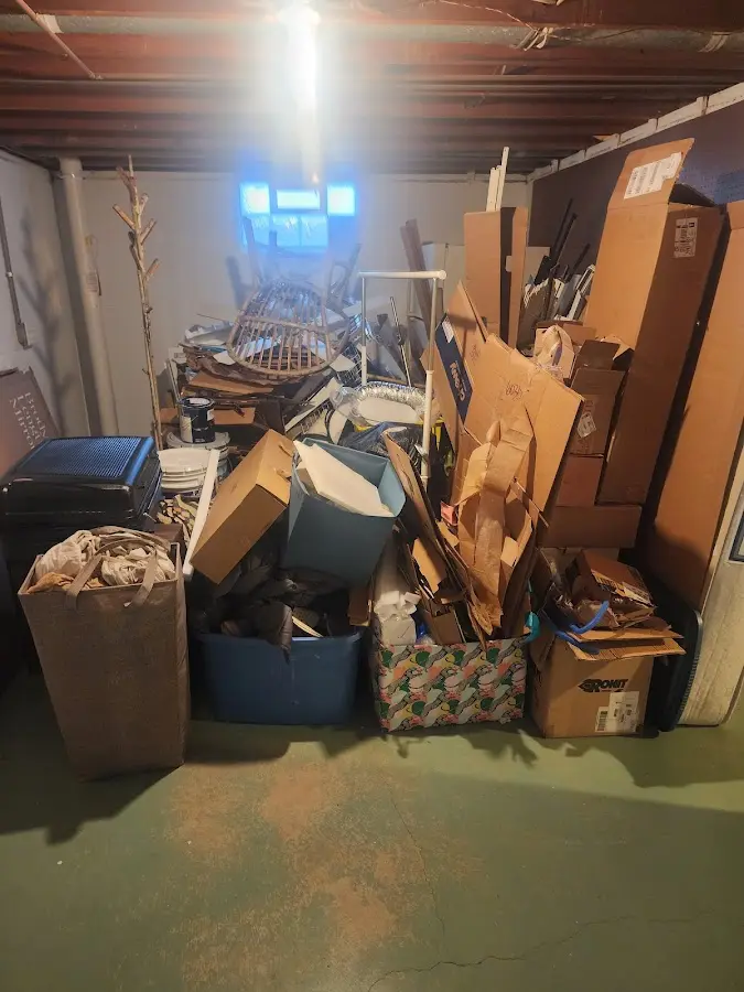 Roll-off dumpster container at job site for 6 Yard Dumpster Rental in Maplewood